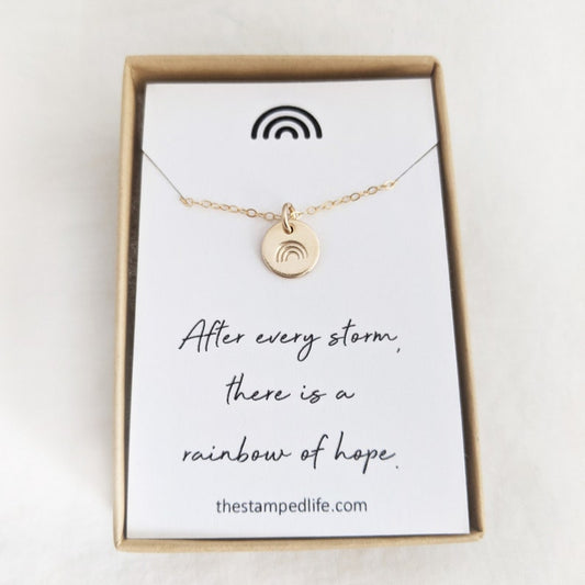 after every storm there is a rainbow of hope charm necklace with rainbow design