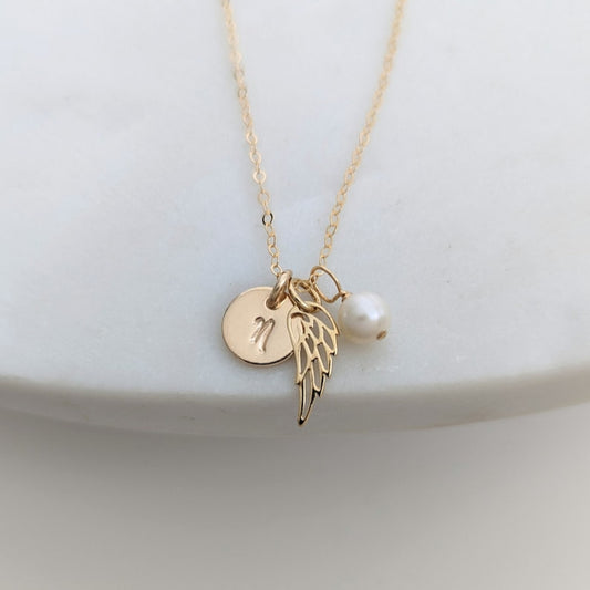 memorial necklace with initial and wing