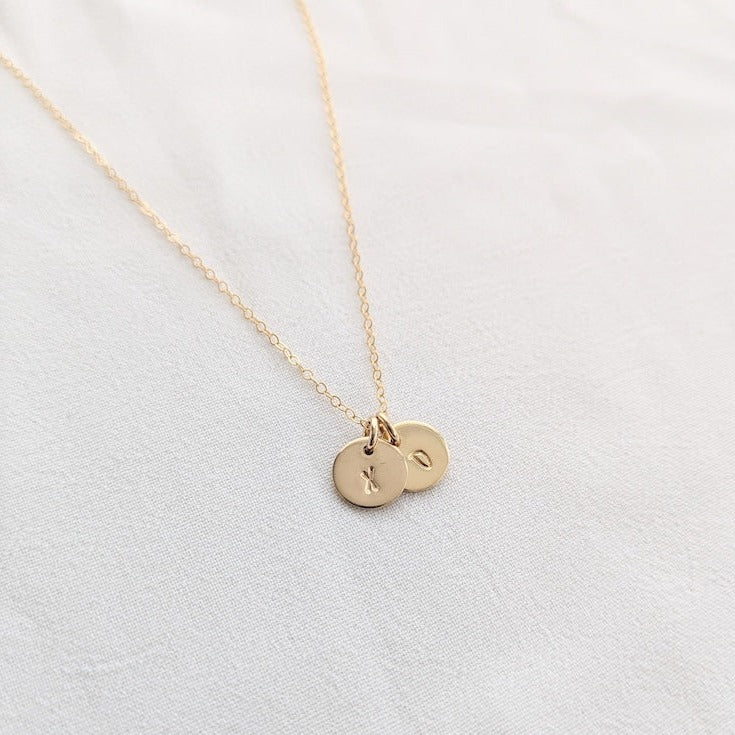 gold necklace with X O charms