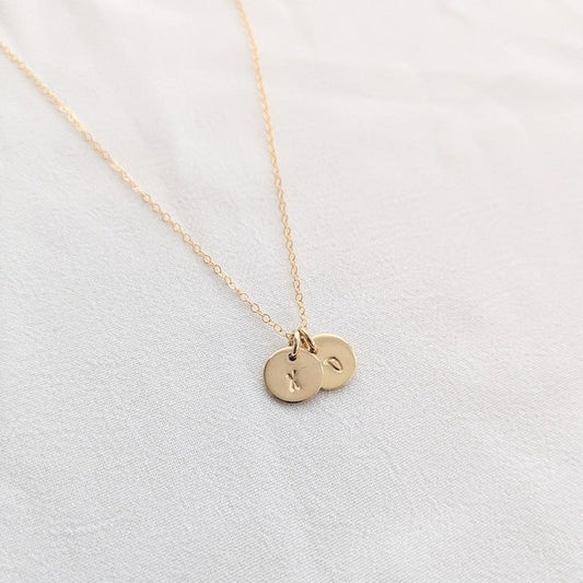 gold necklace with X O charms