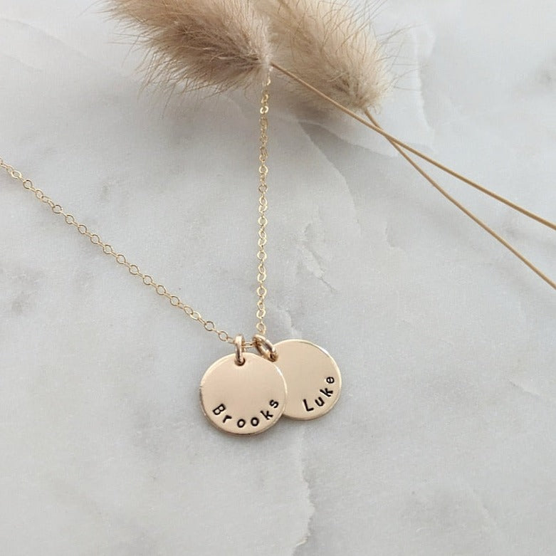 personalized necklace with gold discs and names