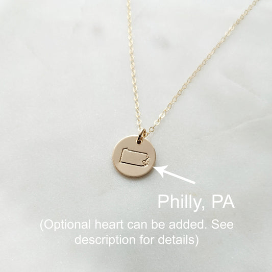 gold disc necklace with heart over Philadelphia