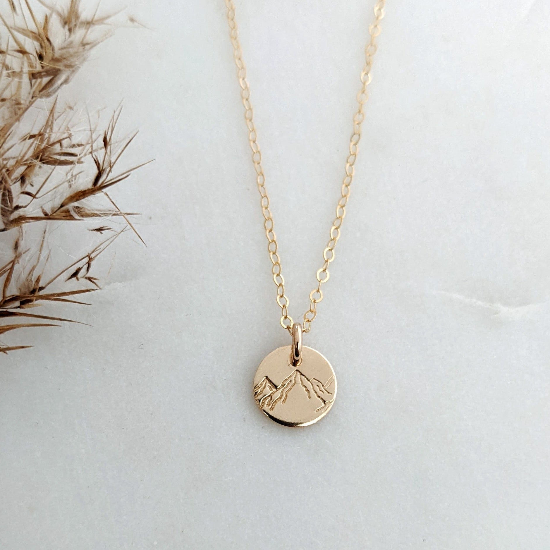tiny gold mountain necklace