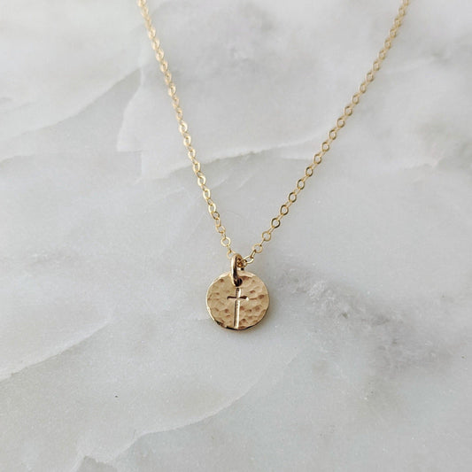 Tiny hammered gold filled disc with cross